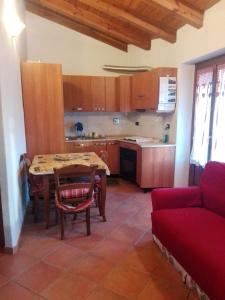 A kitchen or kitchenette at Chaillod 2