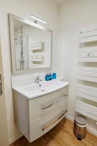 Et badeværelse på Les Appartements Saint-Michel - centre-ville 2 chambres 90m2 avec garage