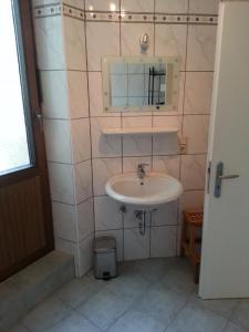 a bathroom with a sink and a mirror at Bernkastler Graben in Bernkastel-Kues +29 photos