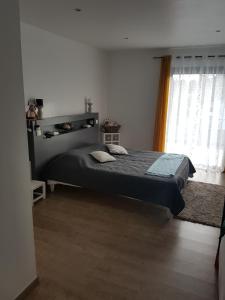 Postel nebo postele na pokoji v ubytování Au bien être