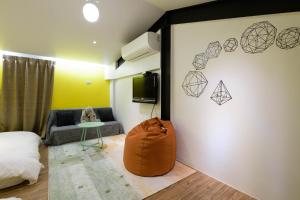 TV a/nebo společenská místnost v ubytování One Attic B&B