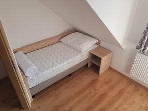 Postel nebo postele na pokoji v ubytování Apartmány Prima Nova Lake