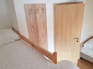 Postel nebo postele na pokoji v ubytování Apartmány Prima Nova Lake