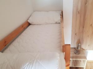 Postel nebo postele na pokoji v ubytování Apartmány Prima Nova Lake