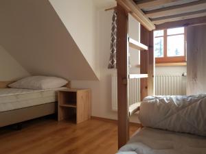 Postel nebo postele na pokoji v ubytování Apartmány Prima Nova Lake