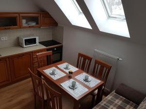 Kuchyň nebo kuchyňský kout v ubytování Apartmány Prima Nova Lake