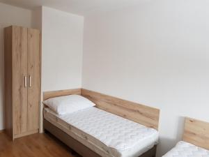 Postel nebo postele na pokoji v ubytování Apartmány Prima Nova Lake