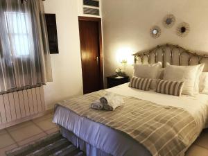 Postel nebo postele na pokoji v ubytování Casa longa