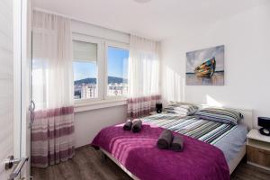 Posteľ alebo postele v izbe v ubytovaní Deluxe Apartment Miro