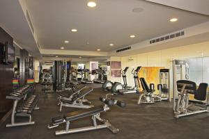a gym with a lot of treadmills and machines at Secrets Vallarta Bay Resort & SPA - Adults Only in Puerto Vallarta
