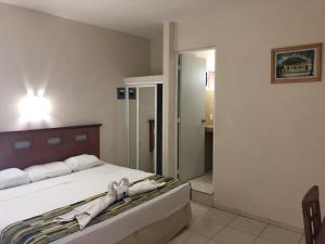 Postel nebo postele na pokoji v ubytování Hotel Xcalak