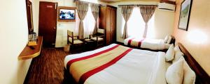 Voodi või voodid majutusasutuse Kathmandu Garden Home toas