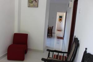 Area soggiorno di Alex Home Stay