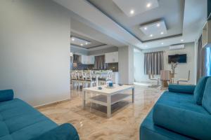 Χώρος καθιστικού στο Natura Verde Villas