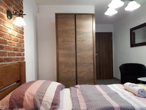 Postel nebo postele na pokoji v ubytování Penzion - Restaurant U Zámku