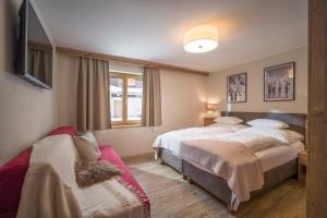 Postel nebo postele na pokoji v ubytování Apartment Gerlos 183