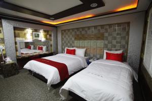 Katil atau katil-katil dalam bilik di Jeonju Hotel