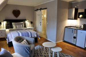 Kuchyň nebo kuchyňský kout v ubytování Friesen-Lodge Apartments