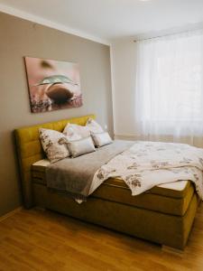 Postel nebo postele na pokoji v ubytování Ferienwohnung Koller + 7 fotografií