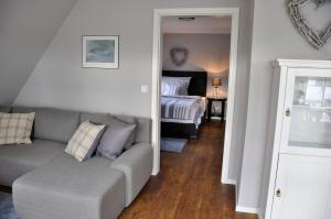 Postel nebo postele na pokoji v ubytování Friesen-Lodge Apartments