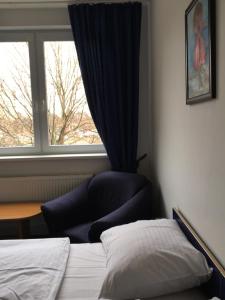 Posteľ alebo postele v izbe v ubytovaní Hotel Arko
