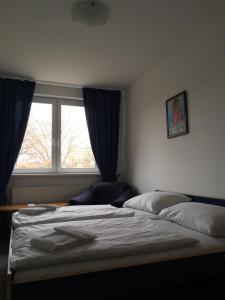 Posteľ alebo postele v izbe v ubytovaní Hotel Arko