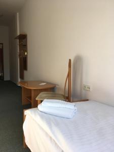 Posteľ alebo postele v izbe v ubytovaní Hotel Arko