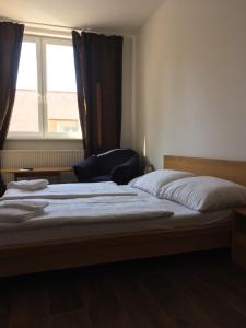 Posteľ alebo postele v izbe v ubytovaní Hotel Arko