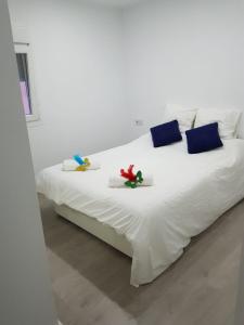 Postel nebo postele na pokoji v ubytování Caleta