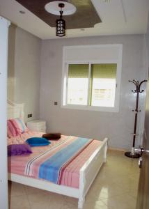 Postel nebo postele na pokoji v ubytování Full Appart Hôtel