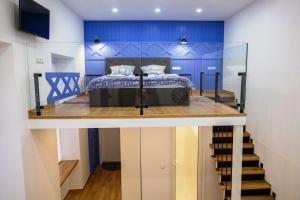 Tempat tidur dalam kamar di Smart City Apartament
