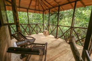 Balkón nebo terasa v ubytování Green Park Safari House & Eco Tree House