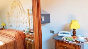 Letto o letti in una camera di Albergo Natucci
