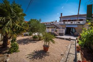 Zahrada ubytování Apartmani Marija Malinska