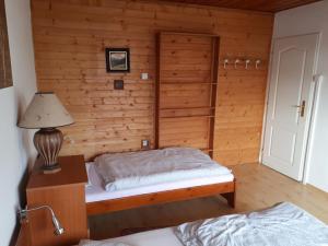 Postel nebo postele na pokoji v ubytování Privát - Melanie