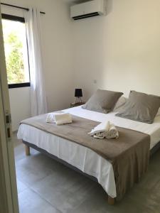Ένα ή περισσότερα κρεβάτια σε δωμάτιο στο Villa Filippi +34 φωτογραφίες