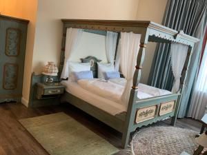 Ein Bett oder Betten in einem Zimmer der Unterkunft Best Western Plus Theodor Storm Hotel