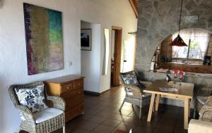 Posezení v ubytování La Hacienda BuenVivir - Apartamentos