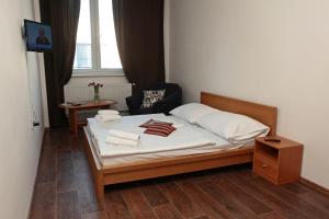 Posteľ alebo postele v izbe v ubytovaní Hotel Arko