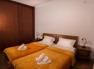 Voodi või voodid majutusasutuse Apartments and rooms Marija toas