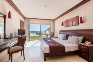 A television and/or entertainment centre at Shams Prestige Abu Soma (Adults Only)