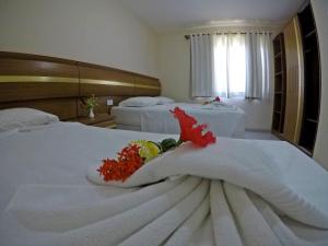 Postel nebo postele na pokoji v ubytování Aquaville Apart Hotel