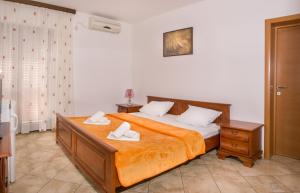 Voodi või voodid majutusasutuse Apartments and rooms Marija toas