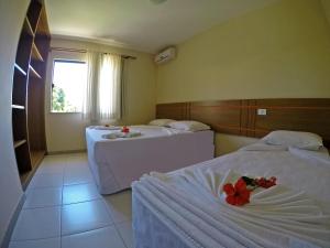 Postel nebo postele na pokoji v ubytování Aquaville Apart Hotel + 37 fotografií