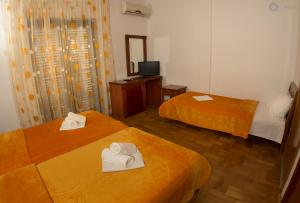 Voodi või voodid majutusasutuse Apartments and rooms Marija toas