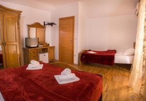 Voodi või voodid majutusasutuse Apartments and rooms Marija toas