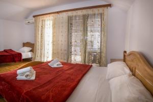 Voodi või voodid majutusasutuse Apartments and rooms Marija toas
