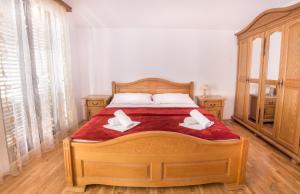 Voodi või voodid majutusasutuse Apartments and rooms Marija toas