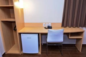 A cozinha ou cozinha compacta de Amapá Hotel