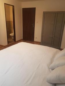 Postel nebo postele na pokoji v ubytování Penzion Rafaella
